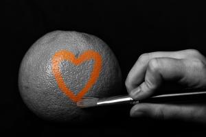 paint heart on an orange